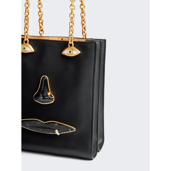 Schiaparelli nose bag