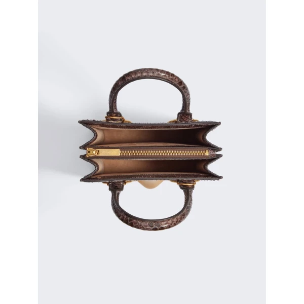 Schiaparelli nose bag