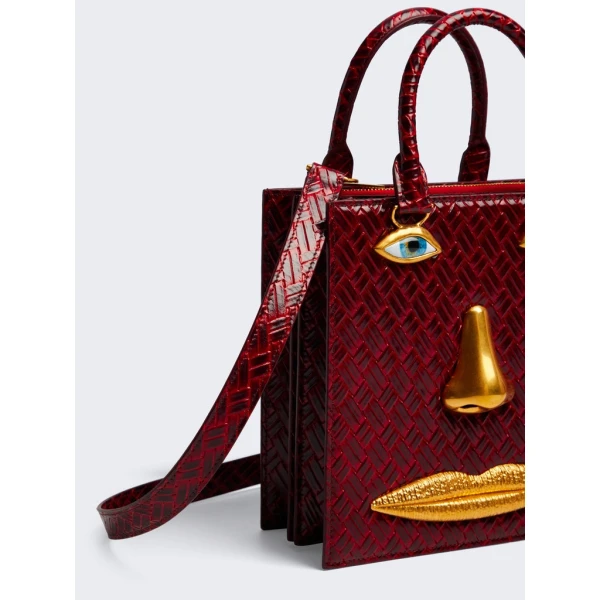 Schiaparelli nose bag