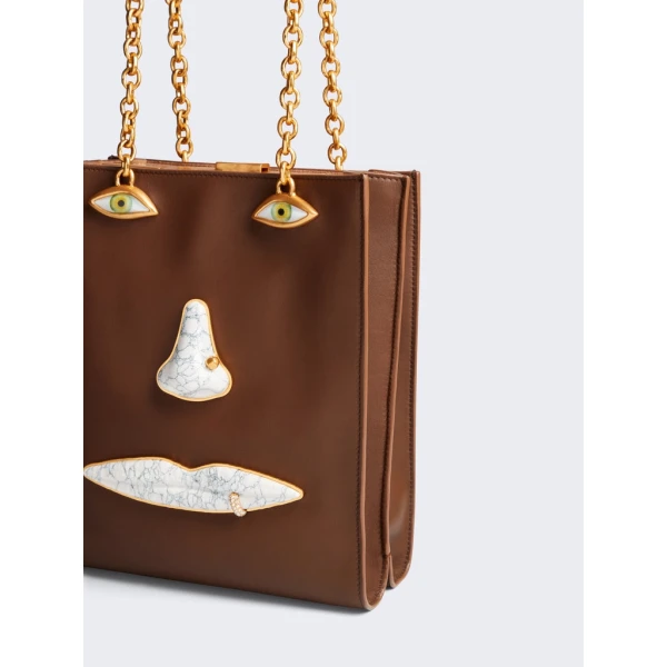 Schiaparelli nose bag