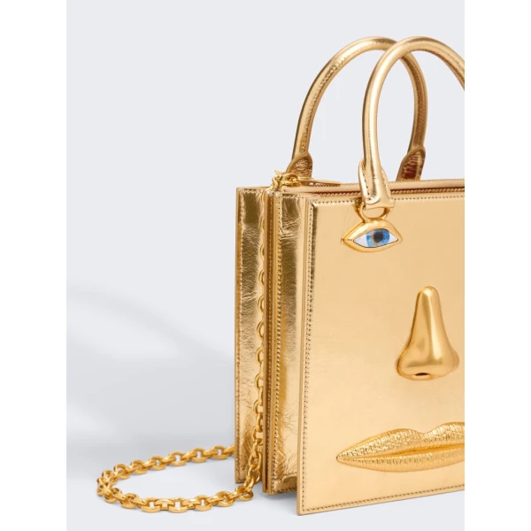Schiaparelli nose bag