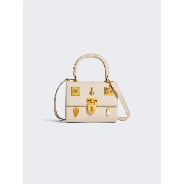 Schiaparelli nose bag