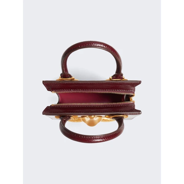 Schiaparelli nose bag