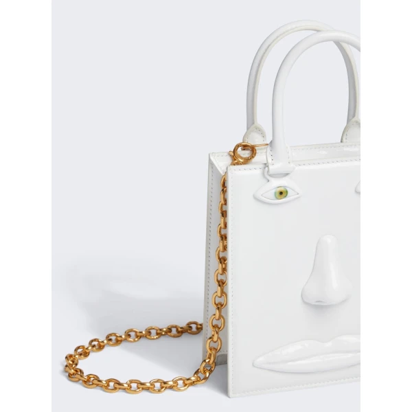 Schiaparelli nose bag