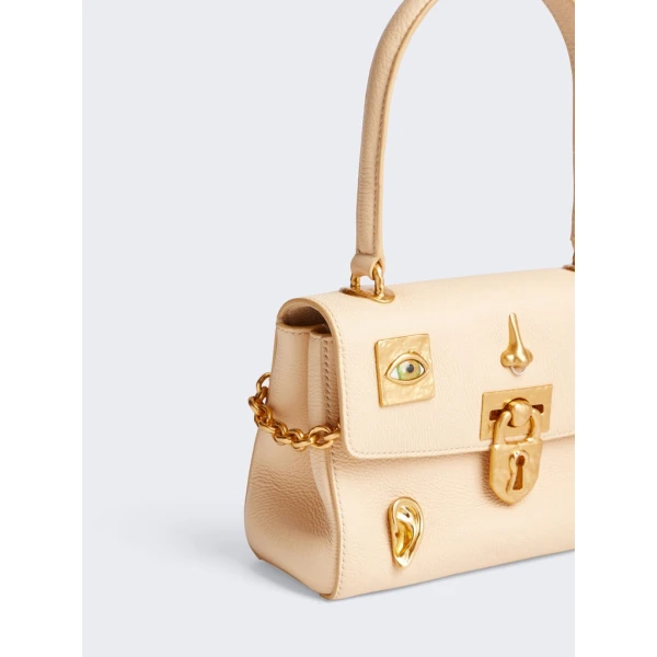 Schiaparelli nose bag