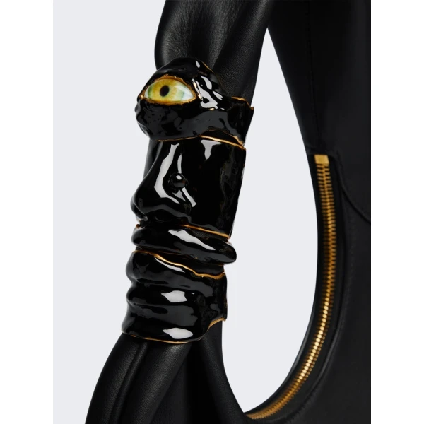 Schiaparelli nose bag