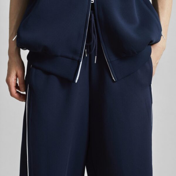 The Frankie Shop Nayen Track Pants - Navy - Oversized Minimalist Pants in Blue - Shop at Coveti