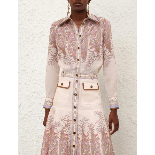Elevate your elegance in this Zimmermann Tops available now at Coveti