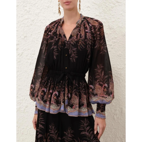 Elevate your elegance in this Zimmermann Tops available now at Coveti
