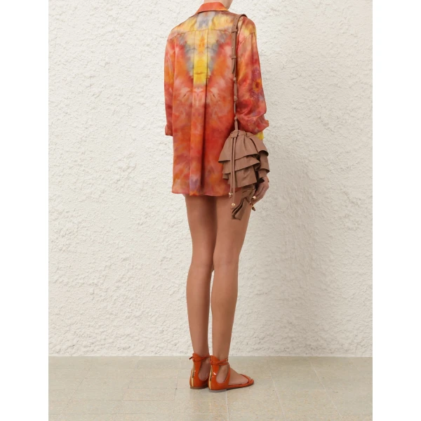 Elevate your elegance in this Zimmermann Tops available now at Coveti
