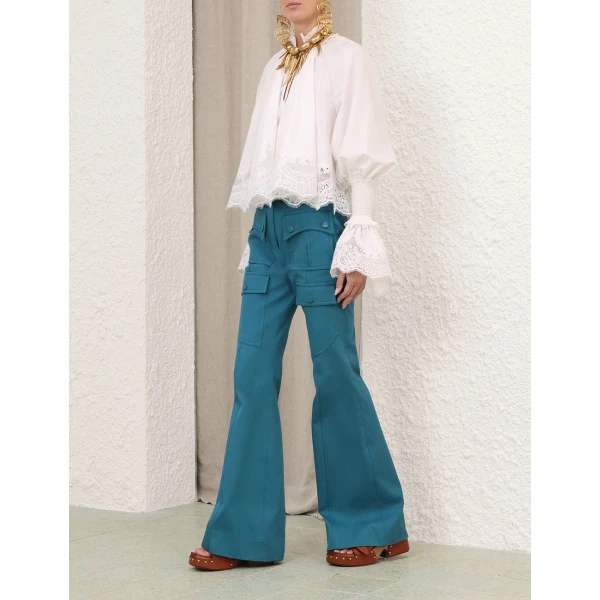 Elevate your elegance in this Zimmermann Tops available now at Coveti