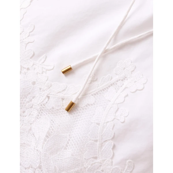 Elevate your elegance in this Zimmermann Tops available now at Coveti