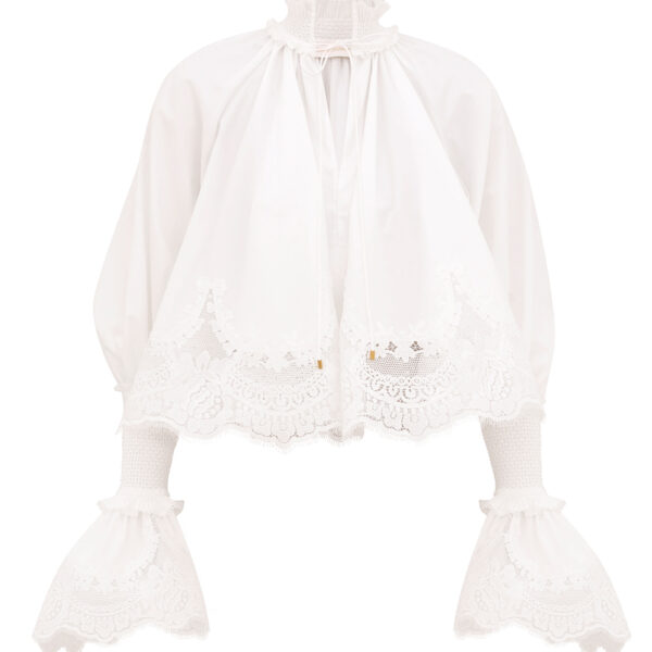 Elevate your elegance in this Zimmermann Tops available now at Coveti