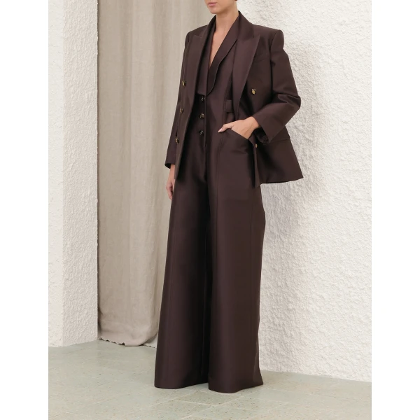 Elevate your elegance in this Zimmermann Jumpsuit available now at Coveti