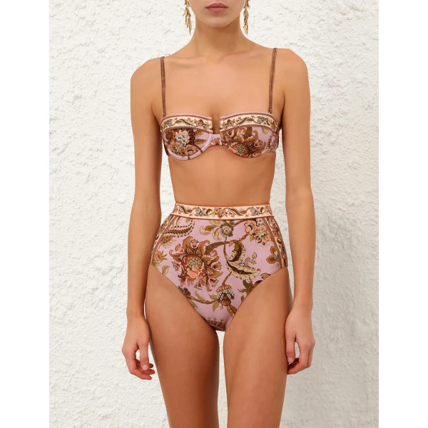 Elevate your elegance in this Zimmermann Tops available now at Coveti