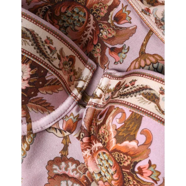 Elevate your elegance in this Zimmermann Tops available now at Coveti