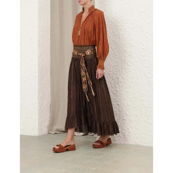 Elevate your elegance in this Zimmermann Tops available now at Coveti