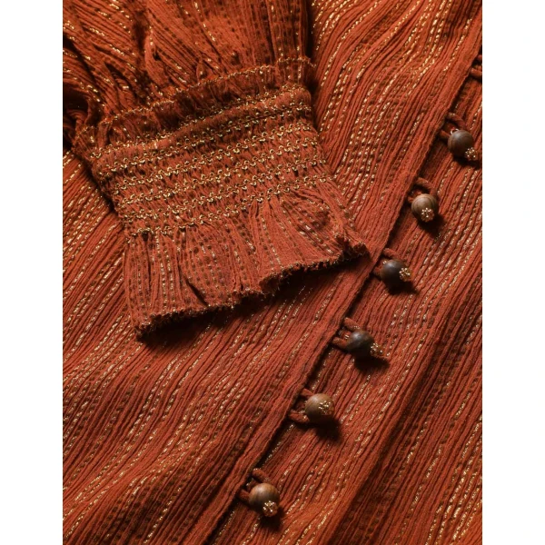 Elevate your elegance in this Zimmermann Tops available now at Coveti