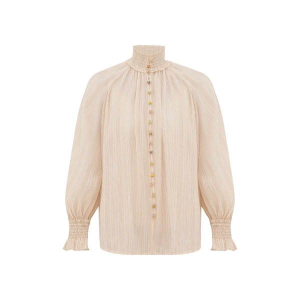 Elevate your elegance in this Zimmermann Tops available now at Coveti