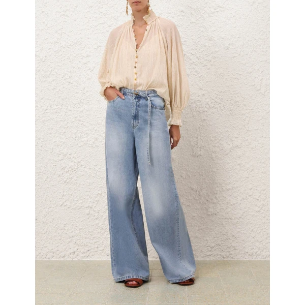 Elevate your elegance in this Zimmermann Tops available now at Coveti