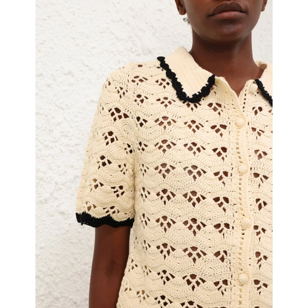 Elevate your elegance in this Zimmermann Tops available now at Coveti