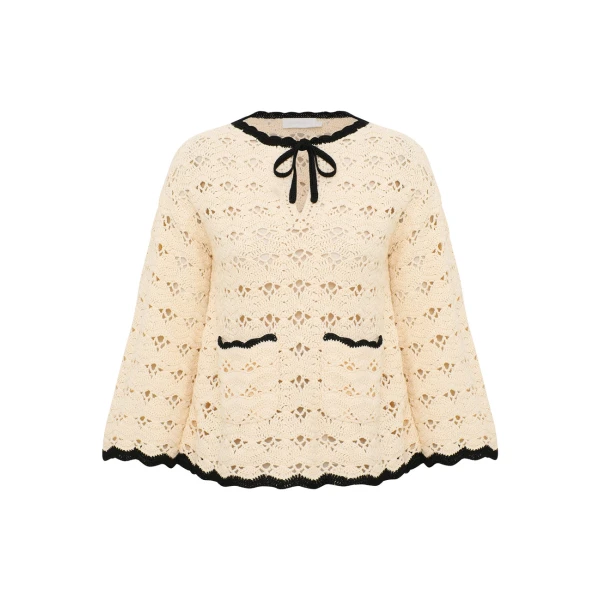 Elevate your elegance in this Zimmermann Tops available now at Coveti
