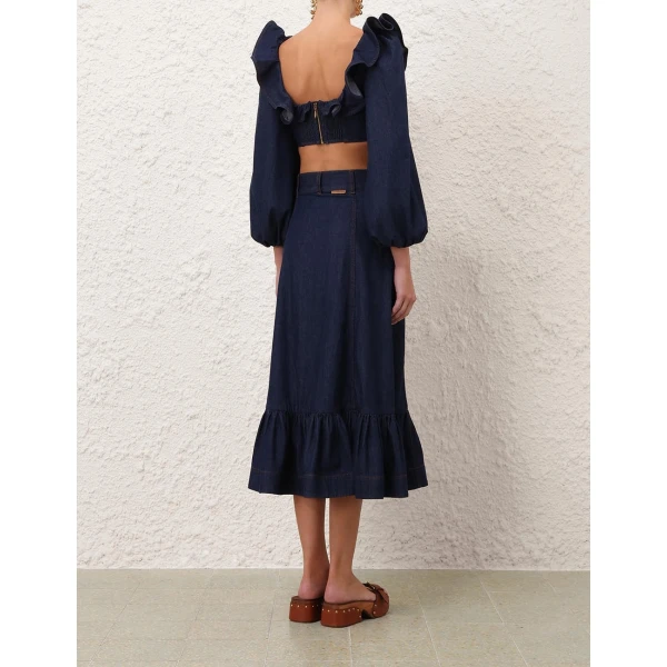 Elevate your elegance in this Zimmermann Tops available now at Coveti