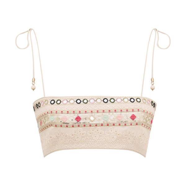 Elevate your elegance in this Zimmermann Tops available now at Coveti