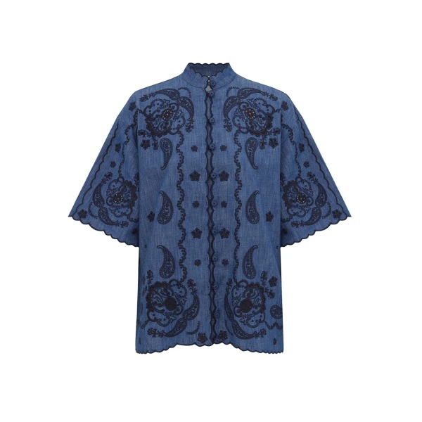 Elevate your elegance in this Zimmermann Tops available now at Coveti