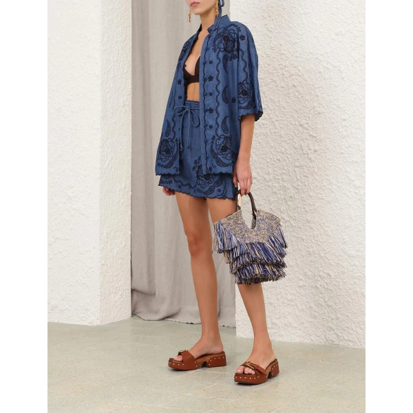 Elevate your elegance in this Zimmermann Tops available now at Coveti