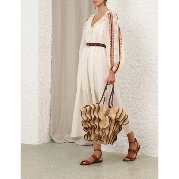 Elevate your elegance in this Zimmermann Dresses available now at Coveti