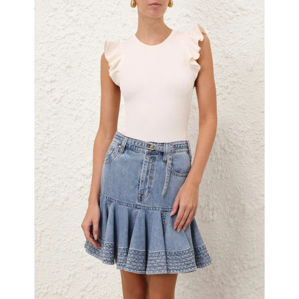 Elevate your elegance in this Zimmermann Tops available now at Coveti
