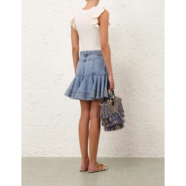 Elevate your elegance in this Zimmermann Tops available now at Coveti