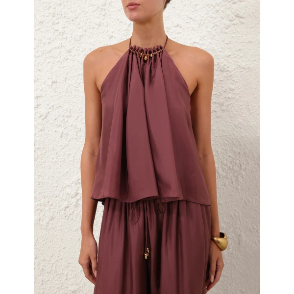 Elevate your elegance in this Zimmermann Tops available now at Coveti
