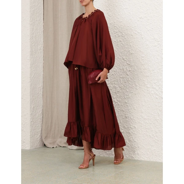 Elevate your elegance in this Zimmermann Skirts available now at Coveti