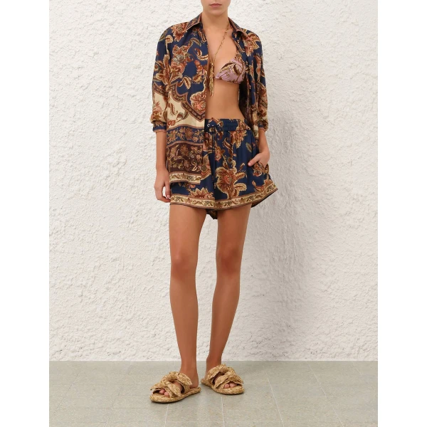 Elevate your elegance in this Zimmermann Tops available now at Coveti