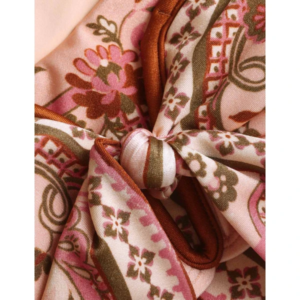 Elevate your elegance in this Zimmermann Beachwear available now at Coveti
