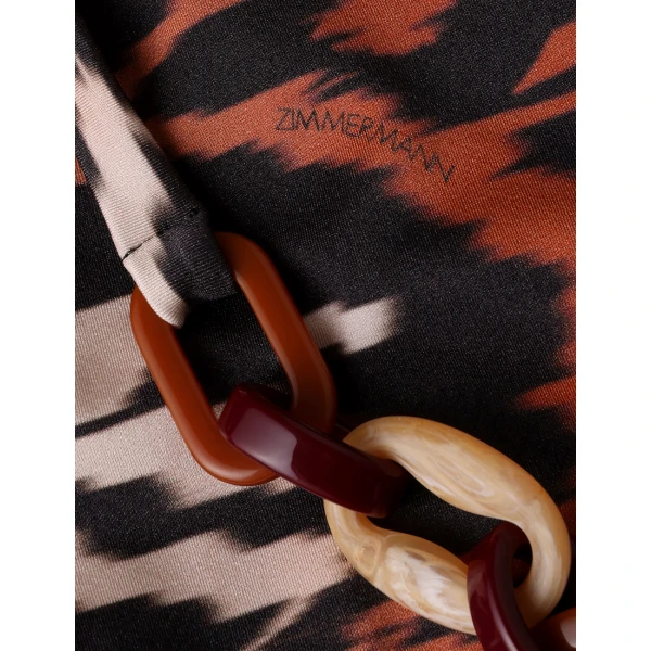 Elevate your elegance in this Zimmermann Beachwear available now at Coveti