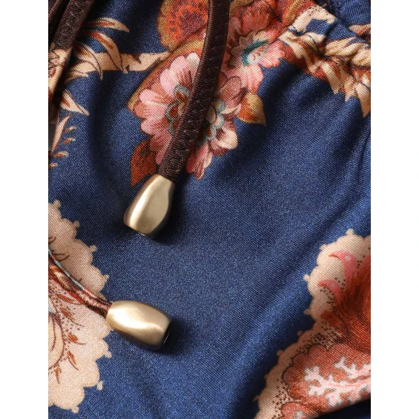 Elevate your elegance in this Zimmermann Beachwear available now at Coveti