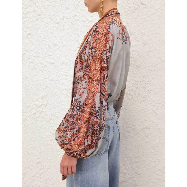 Elevate your elegance in this Zimmermann Tops available now at Coveti