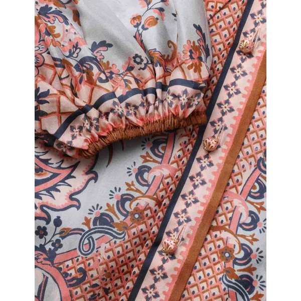 Elevate your elegance in this Zimmermann Tops available now at Coveti