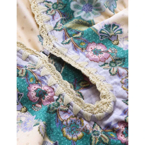 Elevate your elegance in this Zimmermann Beachwear available now at Coveti