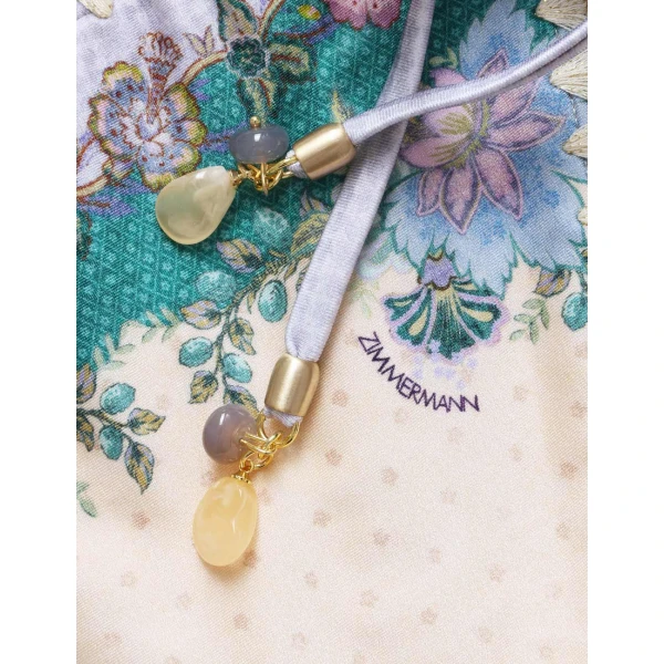 Elevate your elegance in this Zimmermann Beachwear available now at Coveti