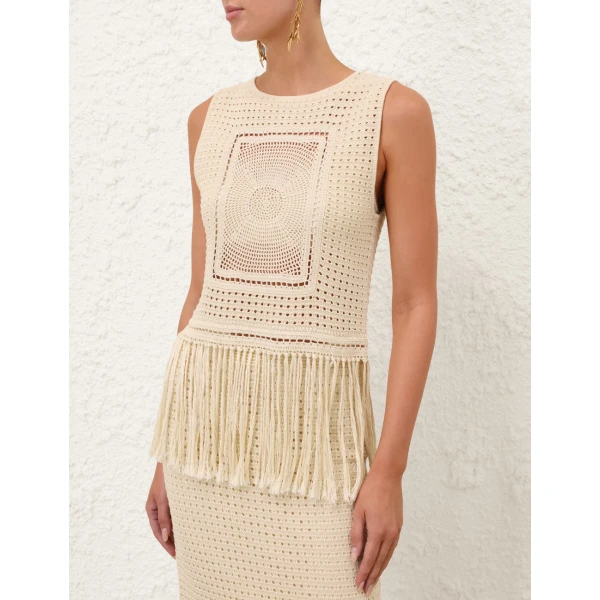 Elevate your elegance in this Zimmermann Tops available now at Coveti