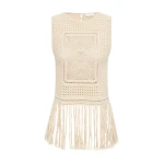 Elevate your elegance in this Zimmermann Tops available now at Coveti
