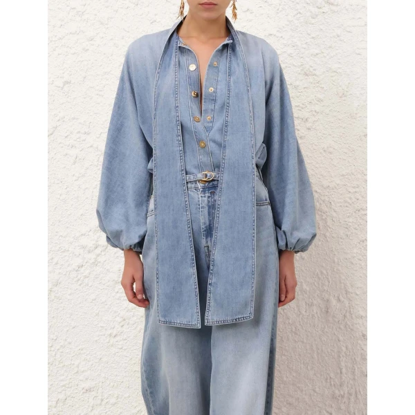 Elevate your elegance in this Zimmermann Tops available now at Coveti