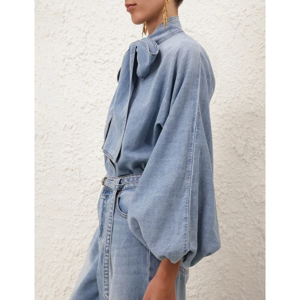 Elevate your elegance in this Zimmermann Tops available now at Coveti