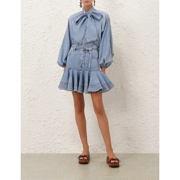 Elevate your elegance in this Zimmermann Tops available now at Coveti