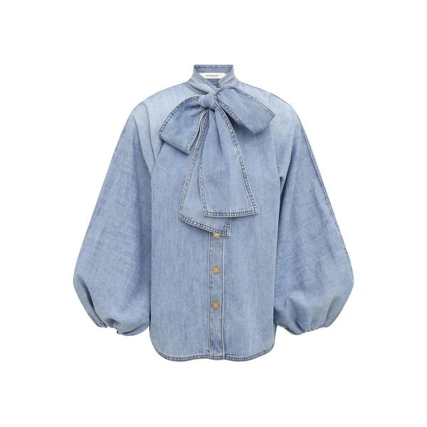 Elevate your elegance in this Zimmermann Tops available now at Coveti