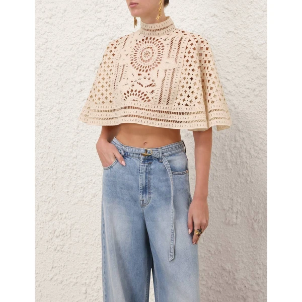 Elevate your elegance in this Zimmermann Tops available now at Coveti